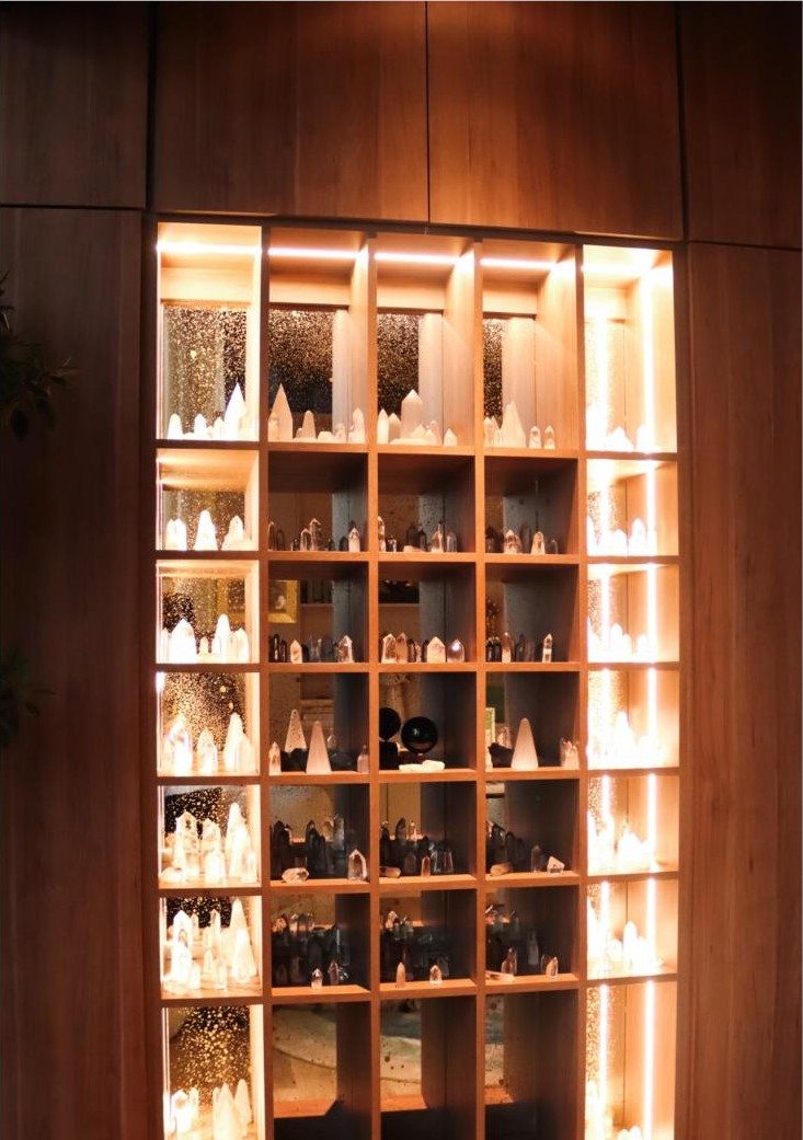 The Cosmic Gate: an illuminated cabinet of quartz points and a sphere of obsidian